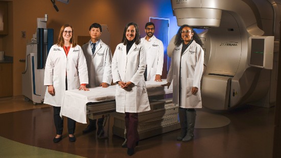 radiation oncology physicians in white coats