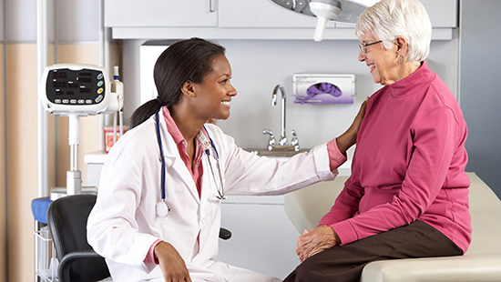 Physician cares for elderly patient