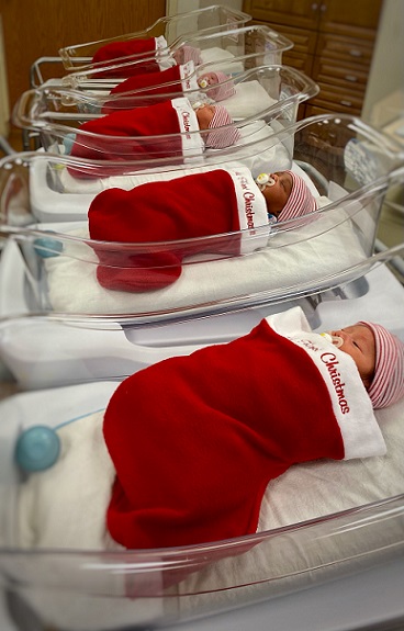 "UM Charles Regional Medical Center's Award-Winning Labor and Delivery Unit Snuggles Christmas Babies in Stockings
