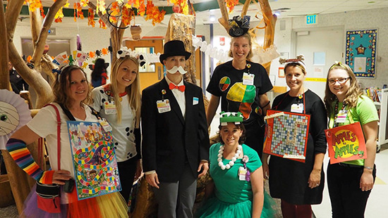 University of Maryland Children's Hopsital Child Life specialists dress up as board games