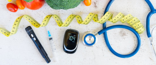 vegetables, measuring tape, needle, cell phone, stethoscope