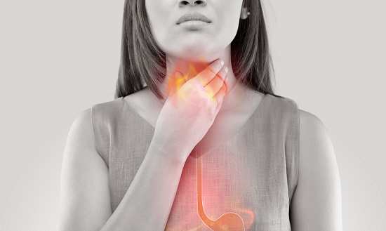 Person holding their throat, esophageal tract shown