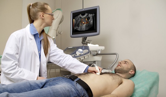 technician giving man echocardiogram