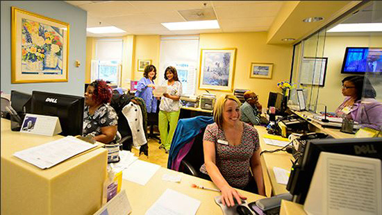Staff at the front desk at the UM Pain Management Center