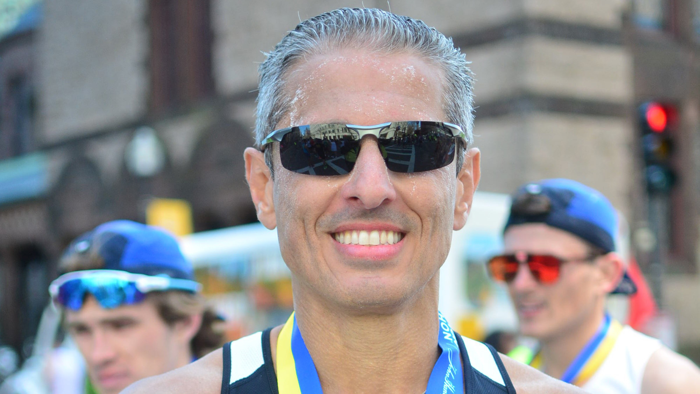 Dr. Kurtom is photographed following running in the Boston Marathon.