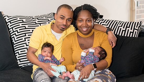 Family with new twin babies