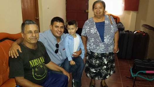 photo of Anastacio with his son and parents