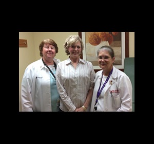 Image of Karyn Staton with the cancer team