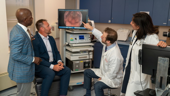 Head and neck cancer specialists consulting about a patient