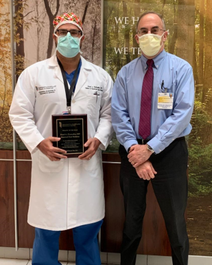 Samuel Galvagno, DO receiving Attending Physician of the Year