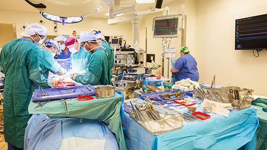 Dr. Bartley Griffith performing aortic valve disease surgery