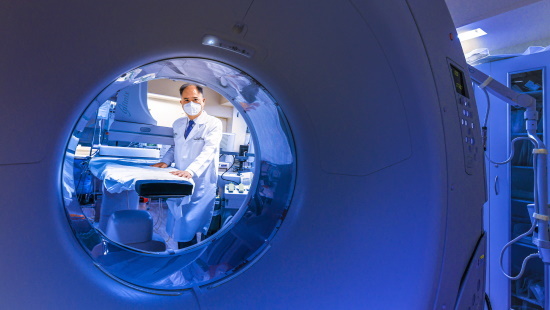 Interventional radiologists with equipment