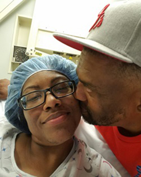 Kidney Transplant recipient Nakia Jackson getting a kiss from her boyfriend