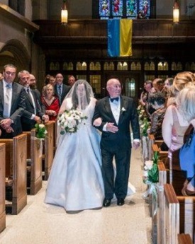 Jim McComiskey walks his daughter down the aisle after a lung transplant