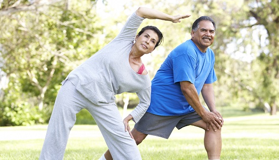 Man and woman in yoga pose