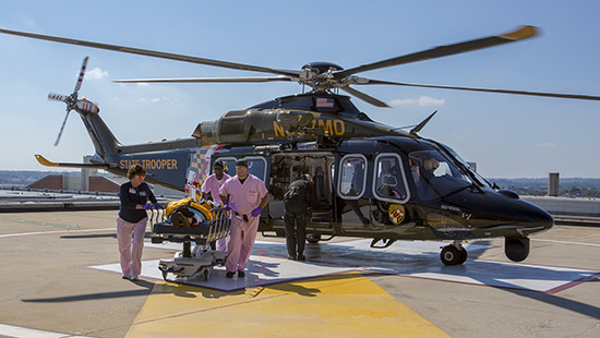 Neurotrauma - Helicopter landing with a patient at UM Shock Trauma Center