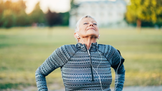 Senior woman breathing deeply